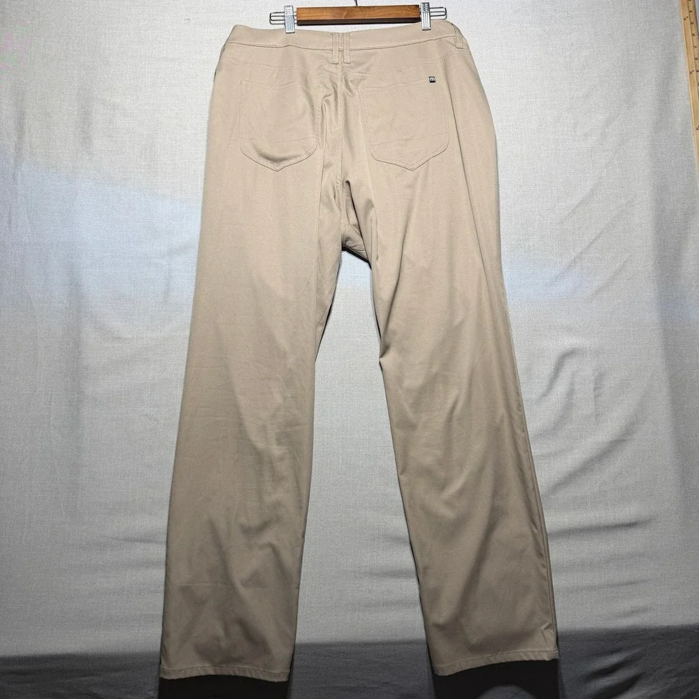 TravisMathew Pants Men 42x32 Khaki Straight Open to Air Golf Performance Chinos